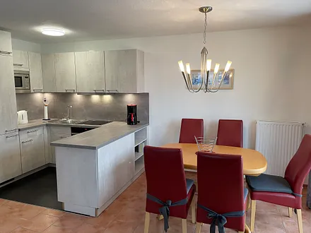 Wohnzimmer mit Küche