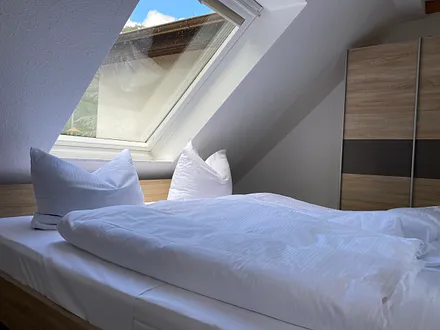 Schlafbereich mit 1,80 m Doppelbett 