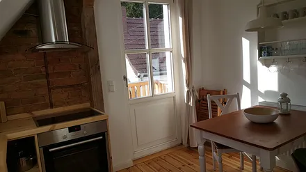 Küche mit Ausgang zum Balkon