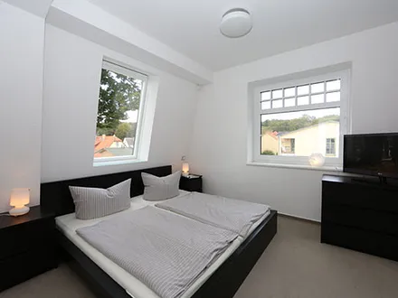 Schlafzimmer mit Bad en suite