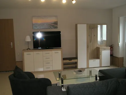 Sideboard mit TV und Garderobe