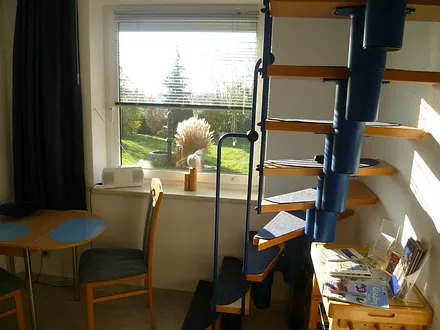 Wendeltreppe in die erste Etage