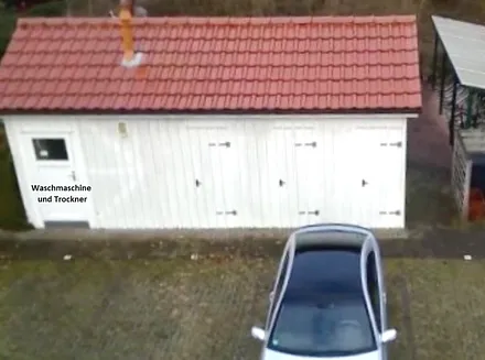 Waschmaschine + Trockner im Nebengebäude