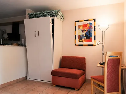 Schrankbett im Wohnzimmer