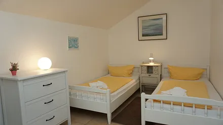 Schlafzimmer mit Einzelbetten