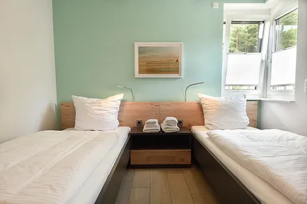 Schlafzimmer mit Einzelbetten