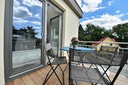 Balkon mit Sitzgelegenheiten