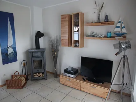 Wohnzimmer mit Kamin