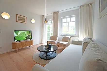  Wohnzimmer mit Schlafcouch