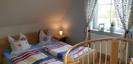 Schlafzimmer mit Doppelbett Obergeschoss 