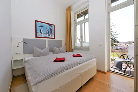 Schlafen mit Zugang zum Balkon