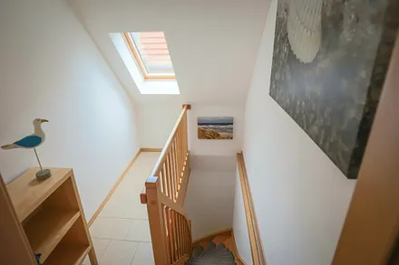 Treppe zur Ferienwohnung Herzmuschel