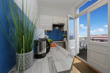 Kochen mit Zugang zum Balkon