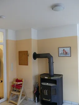 Kaminofen EG-Wohnung; darf aber ab 2025 nicht mehr benutzt werden