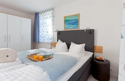 Schlafzimmer mit Doppelbett