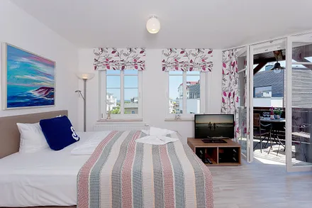 Schlafbereich mit angrenzendem Balkon