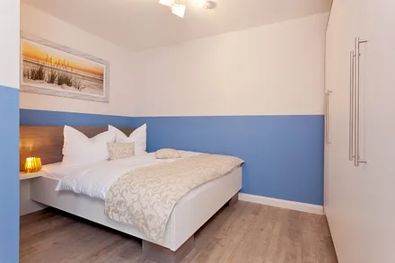 Schlafbereich mit Doppelbett