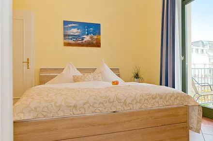 Schlafzimmer mit Balkon