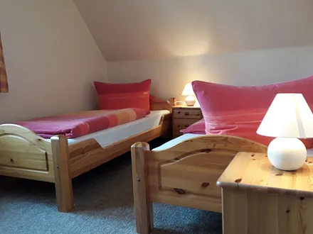 Schlafzimmer mit Einzelbetten