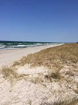 Sonne, Wind und feiner weißer Sand