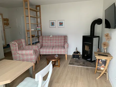 gemütliche Sofaecke mit Kamin