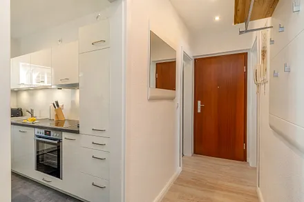 Hier im Bild der Flur mit Garderobe.