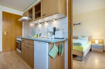 ... Wasserkocher, Toaster und Kaffeemaschine.