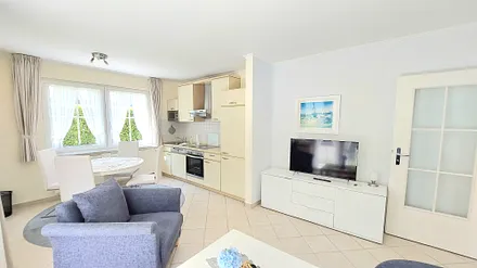 Wohnzimmer mit Küche