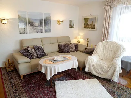 Ledergarnitur mit Sitztiefenverstellung, chices Glasbild