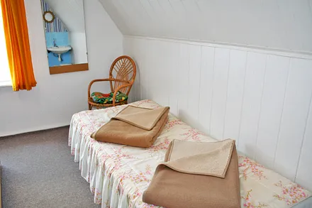 Einzelbett für eine dritte mitreisende Person im Schlafzimmer