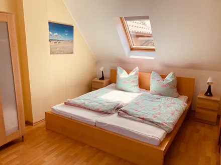 Schlafzimmer mit 2 Doppelbetten 