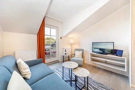 Flat-TV, Stereoanlage mit CD-Player und kostenfreies WLAN sind vorhanden.