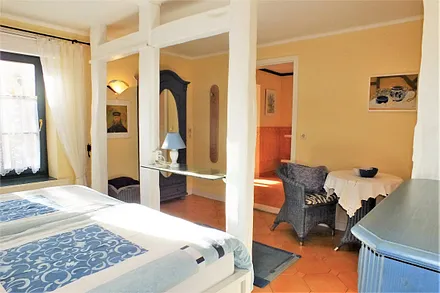 Käpt'n Blue Schlafzimmer mit freigelegten Balken