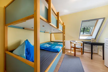 Das Kinderzimmer mit Etagenbett.