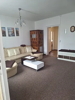 Wohnzimmer mit Schlafcouch 