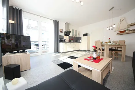 Wohnbereich mit Sitzlandschaft, Leselampe, Smart-TV, Blu-Ray / DVD Player, Sound-Anlage und DAB-Radio