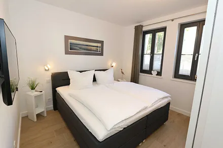 zweites Schlafzimmer mit Boxspringbett