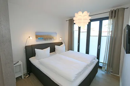 Schlafzimmer mit Doppelbett