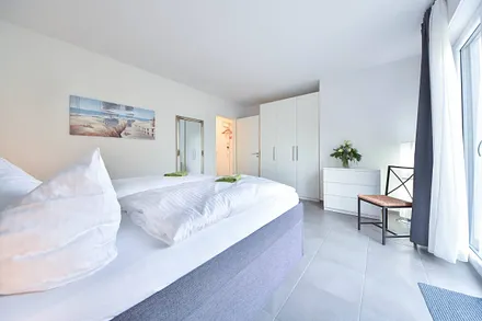 Schlafzimmer mit Doppelbett