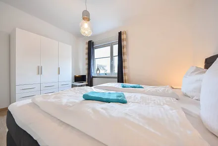 Hauptschlafzimmer mit Boxspringbett