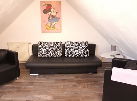 Galerie mit Doppelschlafsofa und Bettsessel