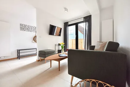 Wohnbereich mit Zugang zur Terrasse