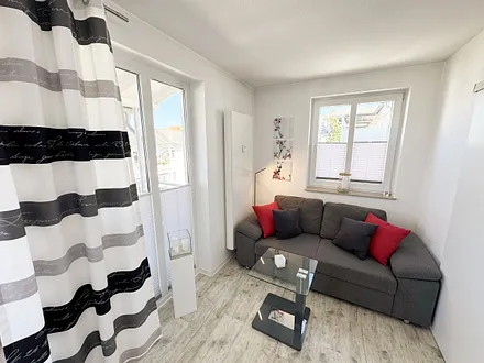 Wohnbereich mit gemütlicher Couch