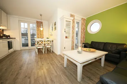 Wohnzimmer mit Blick zu den Dachterrassen