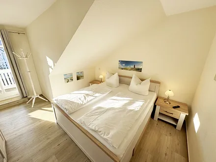 Schlafzimmer mit Doppelbett