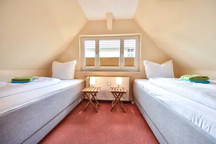 Schlafzimmer mit Einzelbetten