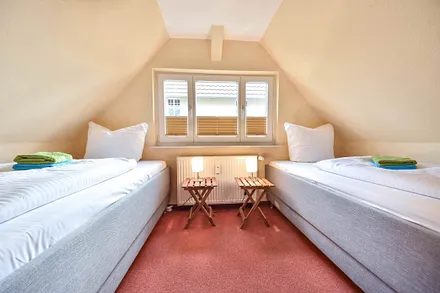 Schlafzimmer mit Einzelbetten