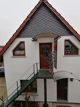 Der Zugang zur Wohnung über eine Metalltreppe