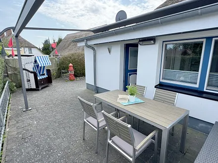 bestuhlte Terrasse (Nord) mit Markise