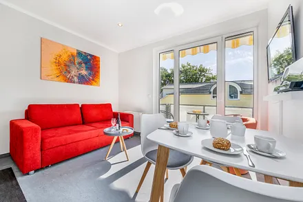 Auf der Couch kann für 1 Person aufgebettet werden.